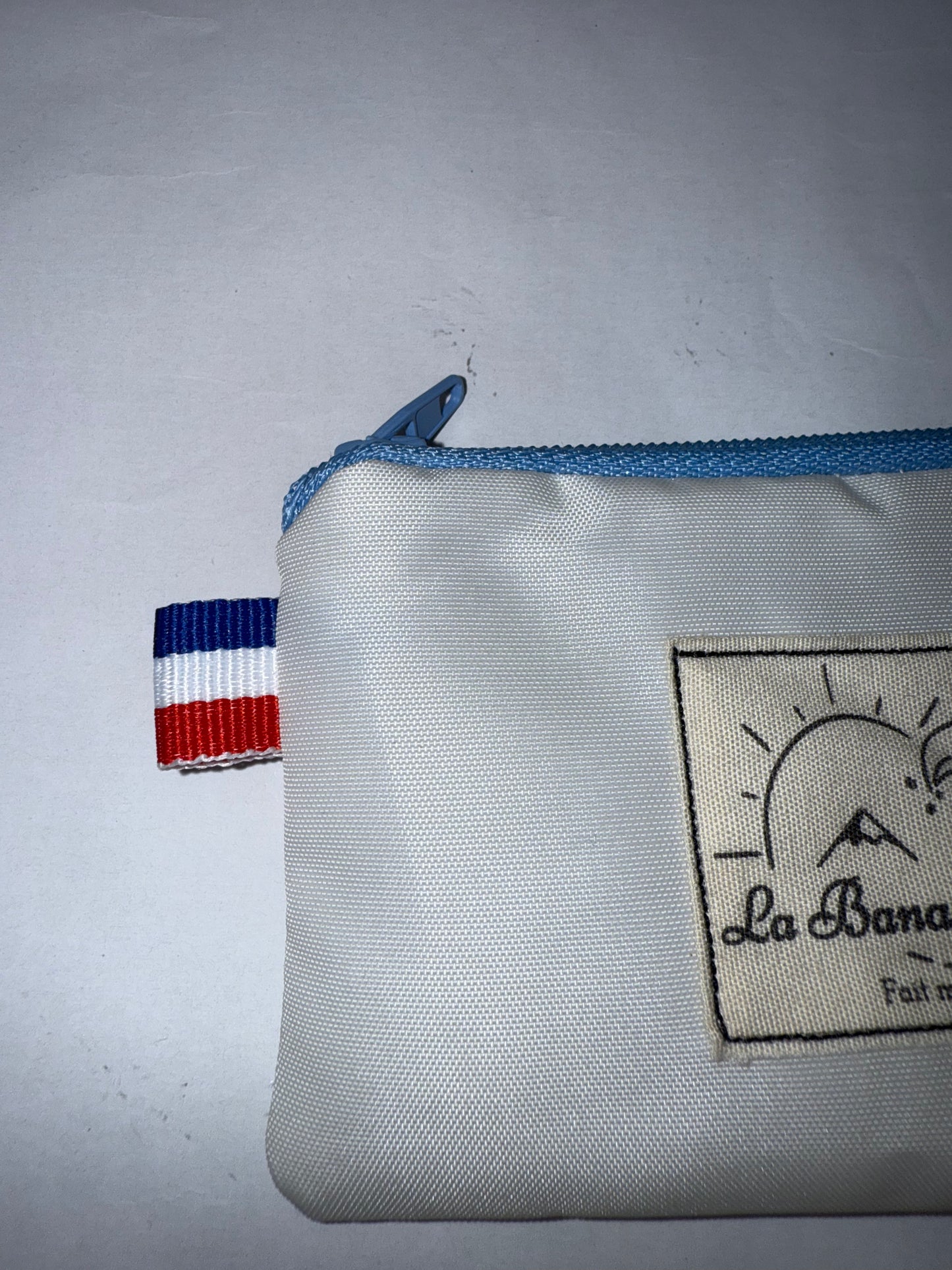 Porte monnaie blanc et bleu