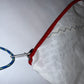 Pochette blanche et rouge